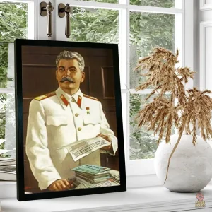 Affiche communiste de Staline en costume blanc avec livres