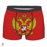 Boxeur rouge avec symbole or du communisme
