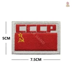 Détail de l'étoile dorée sur l'écusson communiste