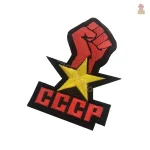 Insigne CCCP avec poing et étoile dorée
